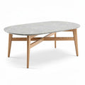 Marble top coffee table with oak legs in oval shape 120 x 70 x 40cm